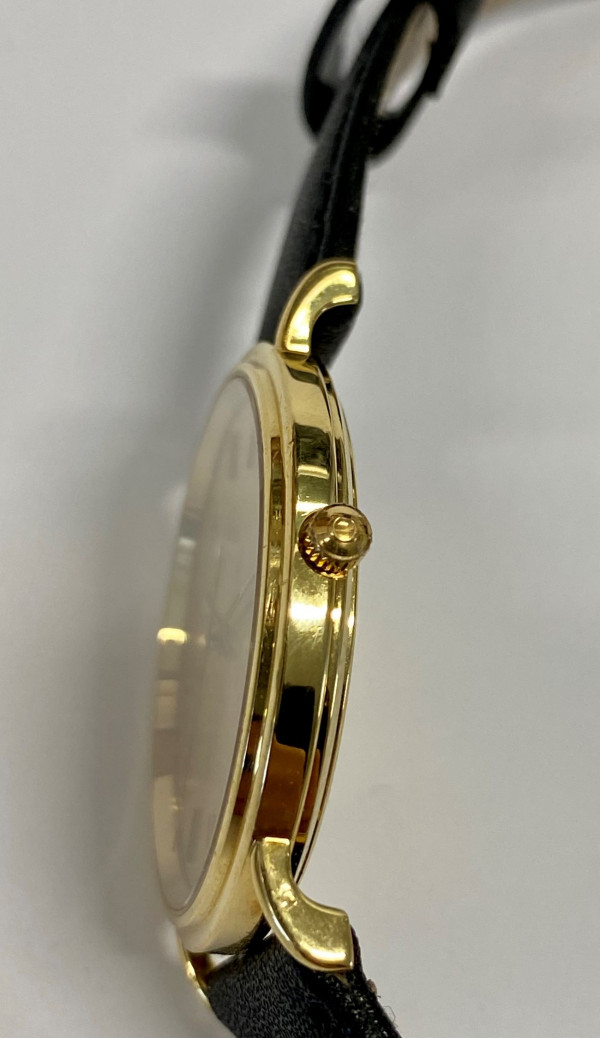 OMEGA quartz kultakello 18k